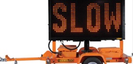 Construction Message Board with the word "Slow"